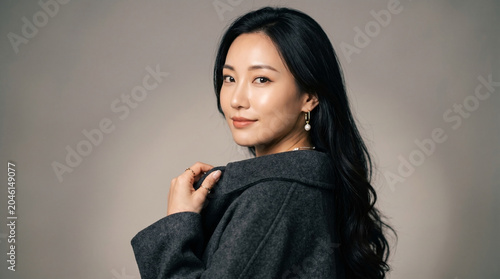 Elegant asian woman in a professional studio beauty portrait