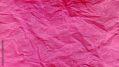 Fotografie Textured vibrant hot pink tissue paper background