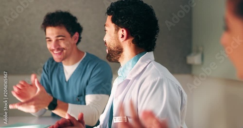 Doctor, team and applause with laptop in hospital for email, medical results and surgery success. Excited, people and cheering with tech for good news, group achievement and excellence for healthcare