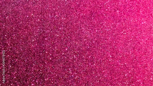 Shimmering hot pink glitter background, with sparkling texture