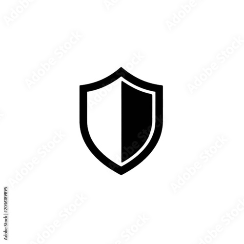Security Shield Symbol: A stark, minimalist graphic representation of a shield, divided into two contrasting halves, symbolizing protection, defense, and security.
