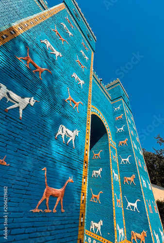 Ancient Babylonia blue wall with decorative animals and ornate details in Iraq