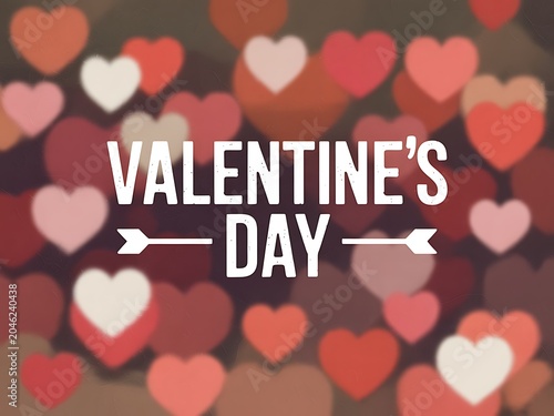 Valentines day celebration with hearts and arrow on brown background