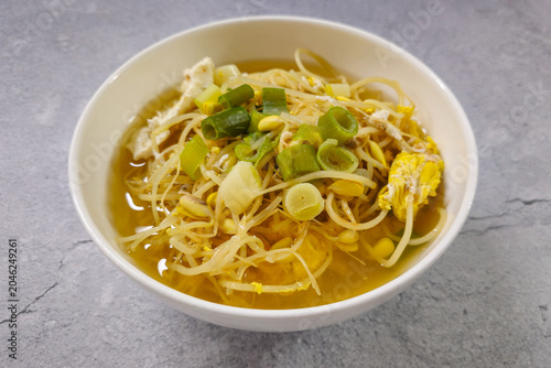 Traditional Korean soybean sprout soup with egg and green onion in clear broth, a healthy homemade Korean comfort food served as a warm everyday meal.
