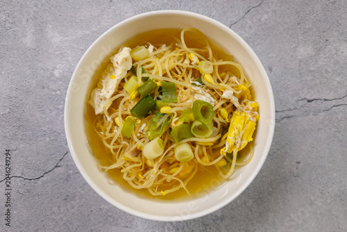 Traditional Korean soybean sprout soup with egg and green onion in clear broth, a healthy homemade Korean comfort food served as a warm everyday meal.