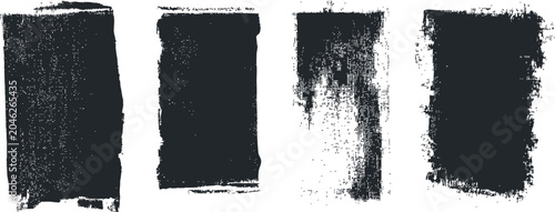set of four black distressed rectangular brush strokes on white background