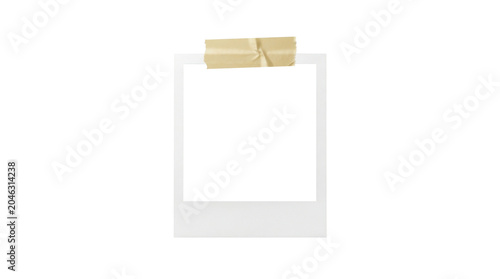 A blank polaroid photo with tape on top isolated on transparent background
