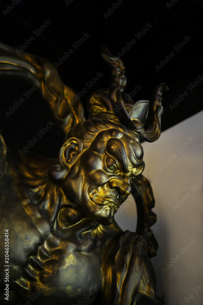 Fototapeta premium Bronze Buddha statues in Chinese temples