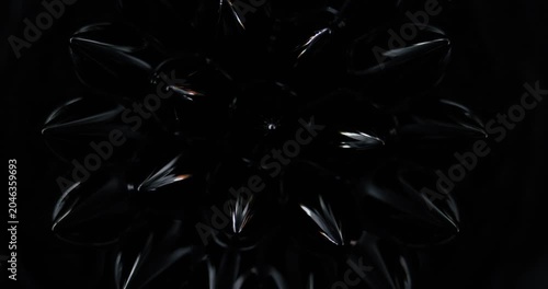 Magnetic fluid. Ferrofluid. Black liquid surface. Abstract background.
