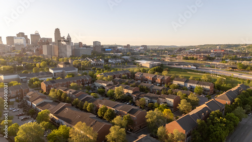High angle aerial drone view over peaceful town neighborhood houses