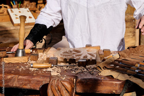 Hands Preparing Food On Wooden Table