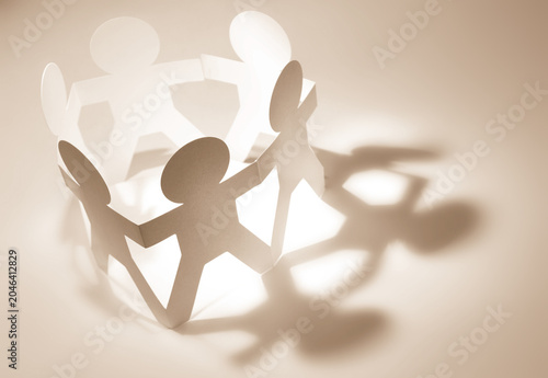 Paper chain team holding hands