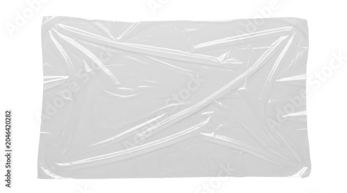 Realistic transparent plastic film texture with wrinkles and folds isolated on transparent background. Packaging design, overlay effect and plastic wrap mockup element.