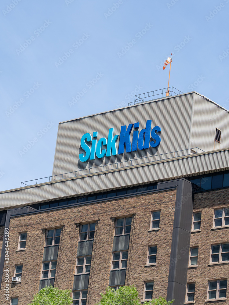 Naklejka premium Toronto, Ontario, Canada - June 2, 2026: SickKids sign on the building of the Hospital for Sick Children (SickKids) in Toronto, Ontario, Canada. 