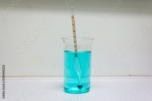 Fotografía Aerometer in a glass with liquid, an aerometer is an instrument designed to measure the density