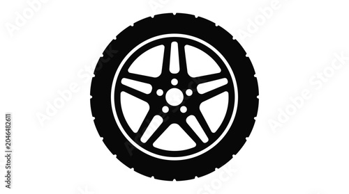 Fotografie A black silhouette of a car wheel with a detailed spoke pattern on a white backg