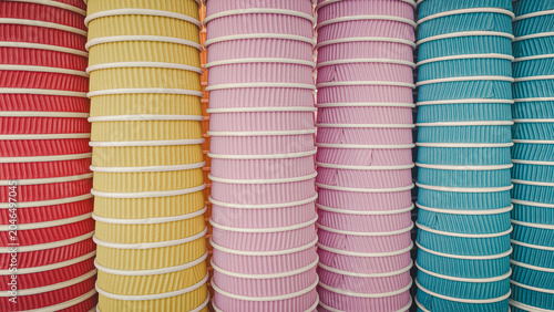 Abstract background of various colorful stacked ripple paper cups for takeaway drinks