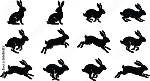 Set of black silhouettes of jumping and running rabbits