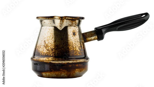 Tableau sur toile Old tarnished copper cezve with black handle, isolated on transparent background