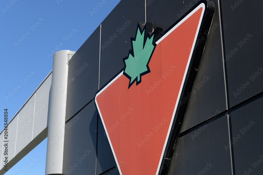 Naklejka premium corporate logo sign of Canadian Tire, a department store, located at 2129 St Clair Av W, Toronto