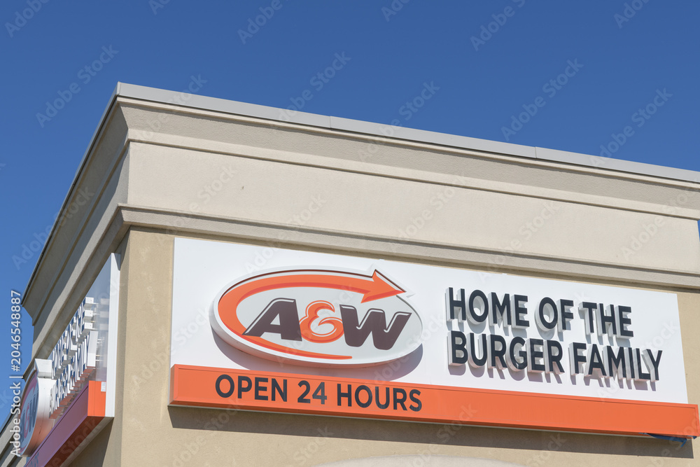 Naklejka premium exterior building and sign of A&W, a hamburger restaurant chain, located at 2151 St Clair Av W, Toronto