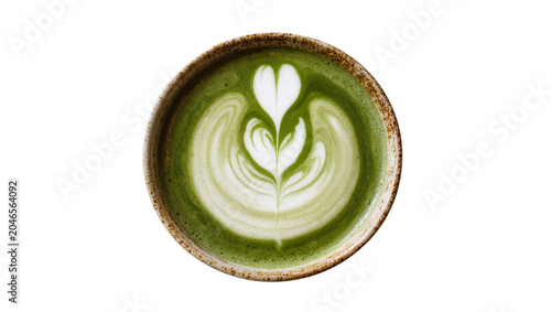Fotografie Green matcha latte with foamy heart art in rustic ceramic bowl, isolated on tran