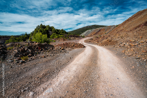 Gravel Road Through Abandoned Mining Quarry in Evia, Greece