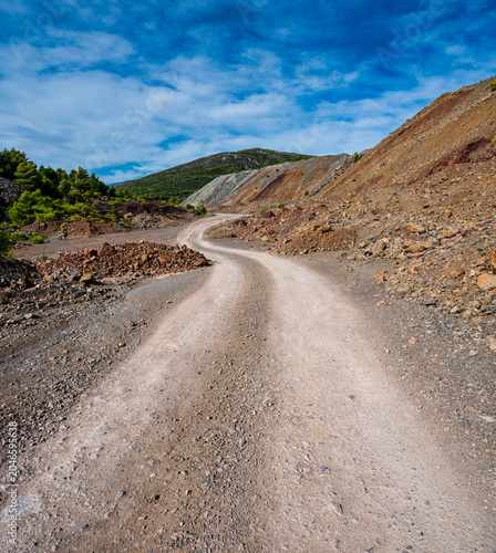 Gravel Road Through Abandoned Mining Quarry in Evia, Greece