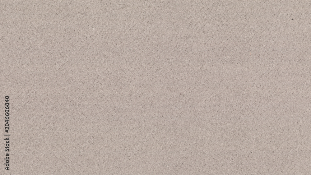 Fototapeta premium Beige textured desktop wallpaper with a subtle, woven fabric appearance
