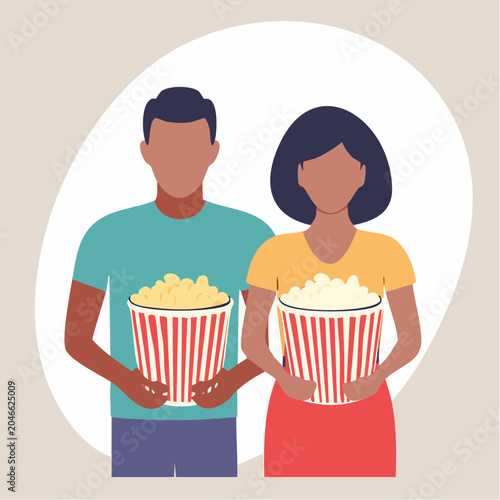 Couple Holding Popcorn Buckets