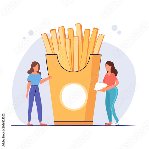 Two women with a giant box of french fries