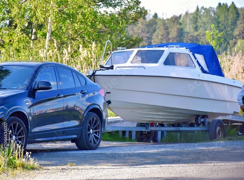 Tableau sur toile Boat on a car trailer. Ready to launch.