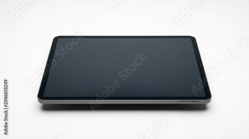 Modern tablet device isolated on transparent background, blank screen, realistic lighting, premium product photography, no branding