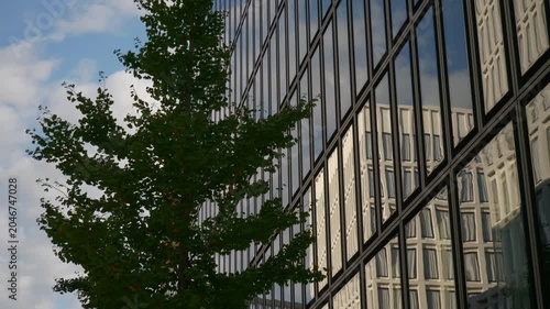sunny day zurich city center modern office buildings front exterior reflection slow motion panorama 4k switzerland