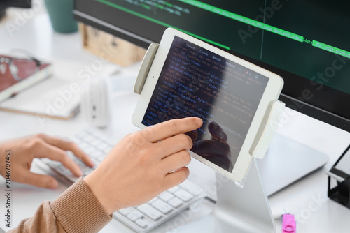 Female programmer's hands t...