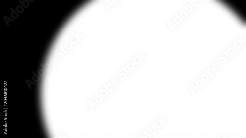 Abstract image features a bright white light curved on a black background with a circular glow and soft edges. Suitable for modern design projects.