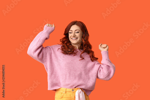Beautiful young happy redhe...