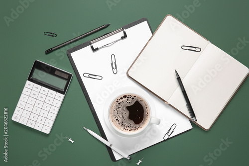 Cup of coffee with notebook...