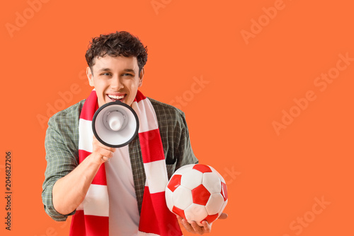 Male football fan with socc...