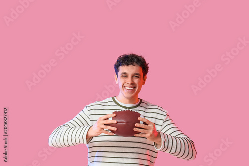 Male football fan with rugb...