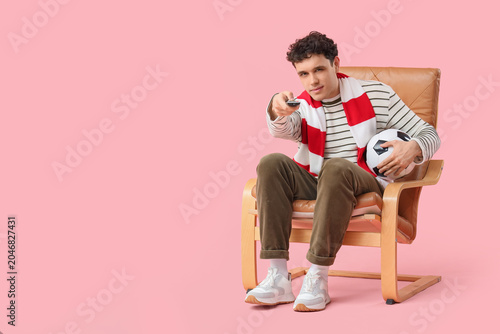 Male football fan with socc...