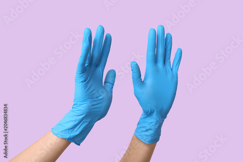 Female hands in medical glo...