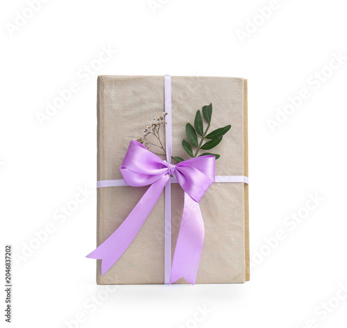 Books tied with lilac ribbo...