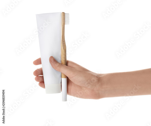 Female hand with toothbrush...