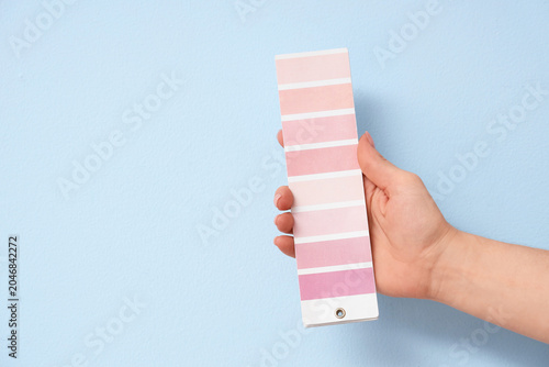 Female hand with pink color...