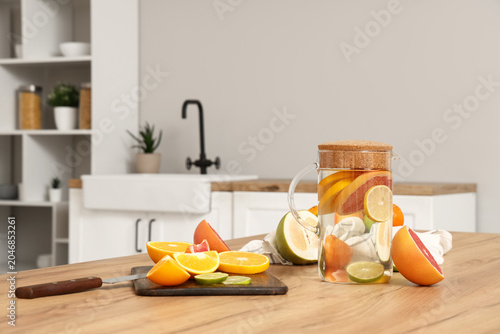 Jug with citrus lemonade an...