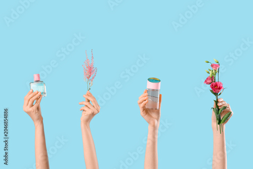 Female hands with bottles o...