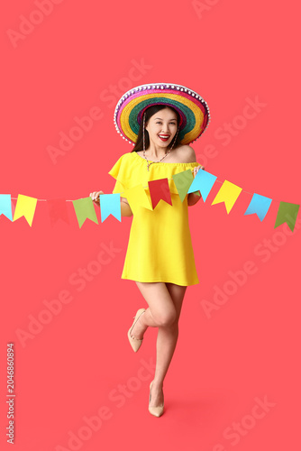 Happy young woman in Mexica...