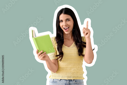 Beautiful woman with book p...