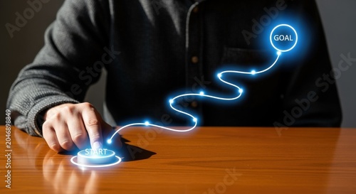 Billede på lærred Hand reaching out to initiate glowing digital pathway towards a clear business g